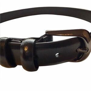 Dockers black leather belt. Silver buckle. Size Youth Medium (26-28). VGUC